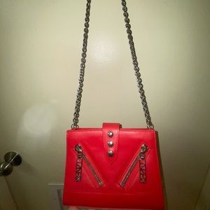 Vulgar red bag. Just never use it.